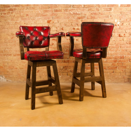 Experience luxury and comfort with the Ainsley Tufted Barstool. Made with hand rubbed red leather, this barstool offers a touch of elegance and durability. The tufted back and seat provide the perfect balance of style and support. Add a touch of the western aesthetic to your home with this stunning barstool.
