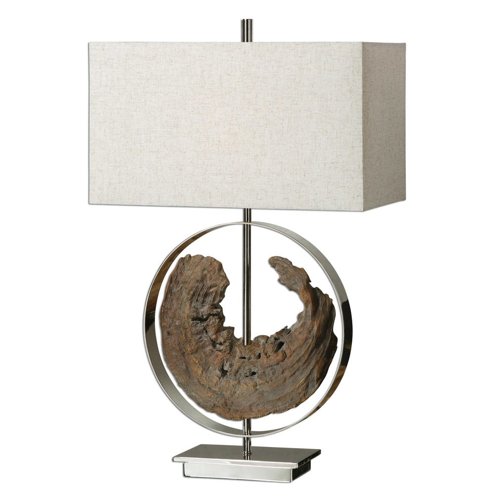 Light up your living space with the Ambler Table Lamp. Its unique design combines classic faux driftwood with a polished nickel plated metal frame for an eye-catching, modern look. The hardback shade is a durable linen fabric with subtle natural slubbing, perfect for making any room shine.