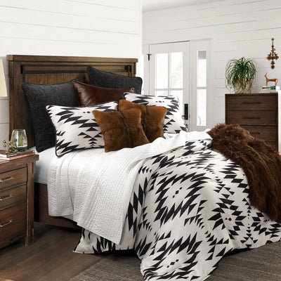 Experience the perfect balance of modern style and cozy comfort with the Chalet Aztec Comforter Set. With its luxuriously plush chenille and striking geometric design, it's sure to elevate any bedroom. This set features an earthy palette that blends well with various decor styles. Make a statement in any room with the Chalet Aztec Comforter Set.