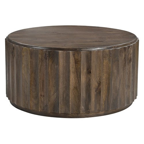 Introducing the Austen Round Coffee Table - the perfect addition to any living room. Crafted from solid wood, this round coffee table is both durable and stylish. With its sleek design and sturdy construction, it will add a touch of elegance to your space.