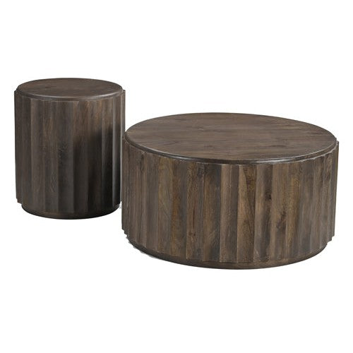 Introducing the Austen Round Coffee Table - the perfect addition to any living room. Crafted from solid wood, this round coffee table is both durable and stylish. With its sleek design and sturdy construction, it will add a touch of elegance to your space.