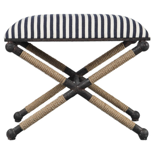 Rustic iron frame with a nautical touch, wrapped in natural fiber rope accents. Cushioned top is a sturdy, sailor-striped cotton in crisp navy and cream.