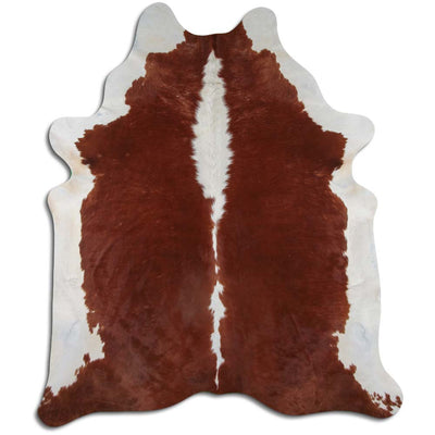 One-of-a-kind Brazilian cowhide rug with rich tones and soft texture