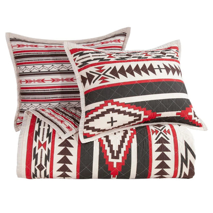 The Cortez Quilt Set is the perfect way to bring excitement to your bedroom. Inspired by iconic Western scenes, the bold crimson, black, and neutral tones create a vivid geometric pattern that stands out against any decor. Crafted with soft cotton filling, you can relax in comfort while still experiencing a splash of adventure. Reversible for easy transitioning, refresh your sleeping space with a simple flip of the quilt.