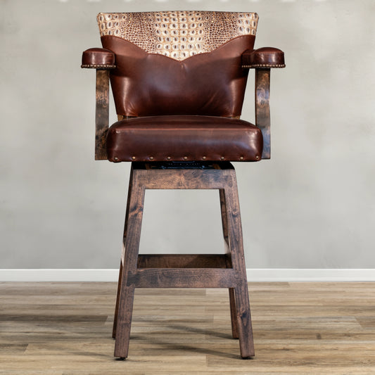 Expertly crafted with a top grain leather seat and embossed Croc leather yoke, the Croc Yoke Chisum Barstool brings a touch of western charm to any bar or kitchen counter. Enjoy superior comfort and durability with this high-quality, stylish barstool.