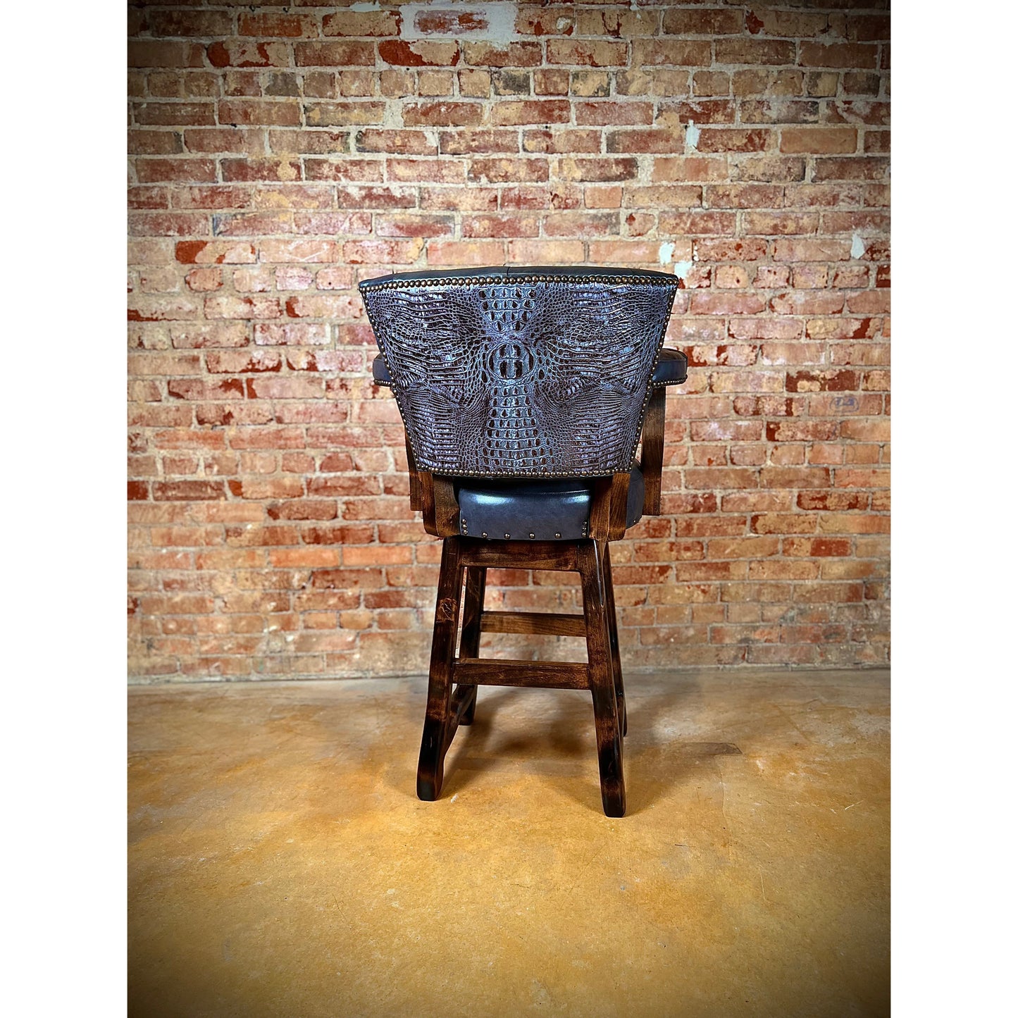 Embossed crocodile back on a solid wood and leather bar stool