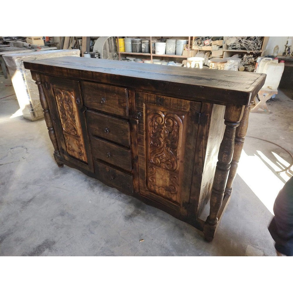 The Flora Buffet is a perfect choice for those looking to add a touch of rustic elegance to their home. Crafted from solid reclaimed wood and hand-carved, this sideboard or buffet is sure to bring a classic touch to any space.