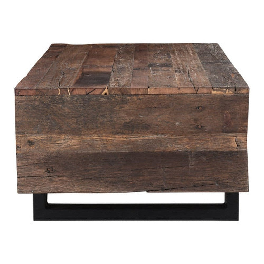 Welcome the Frank Rectangle Coffee Table, crafted from rustic reclaimed wood and a metal base. Featuring an Old World charm, this piece is perfect for incorporating a hint of rustic elegance into any living space. Let its combination of modern and classic stylings elevate the atmosphere of your home.