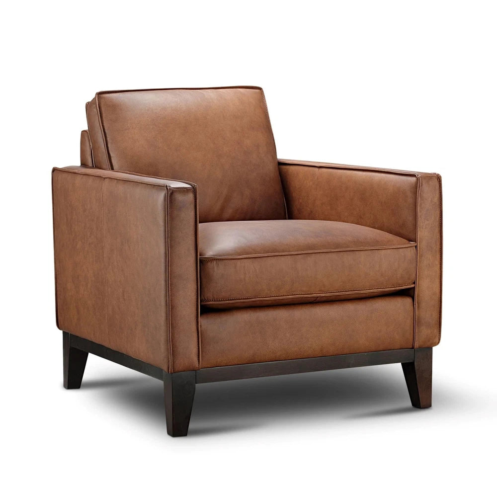 The Frisco Chair is an exquisite piece of furnishing, carefully crafted with top-grain leather and pocketed coil seating for superior comfort. It features a square arm and leg, giving it a stylishly modern look that can blend in with both Western and contemporary decor.