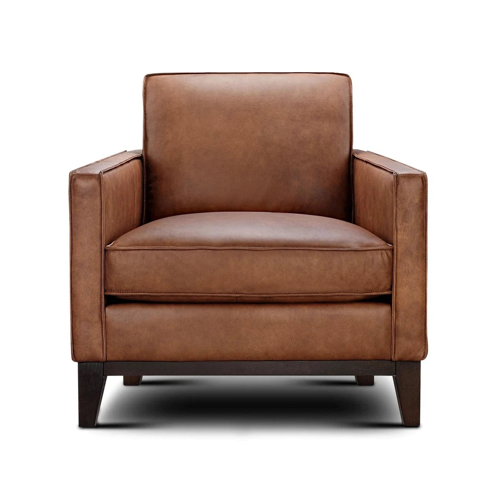 The Frisco Chair is an exquisite piece of furnishing, carefully crafted with top-grain leather and pocketed coil seating for superior comfort. It features a square arm and leg, giving it a stylishly modern look that can blend in with both Western and contemporary decor.