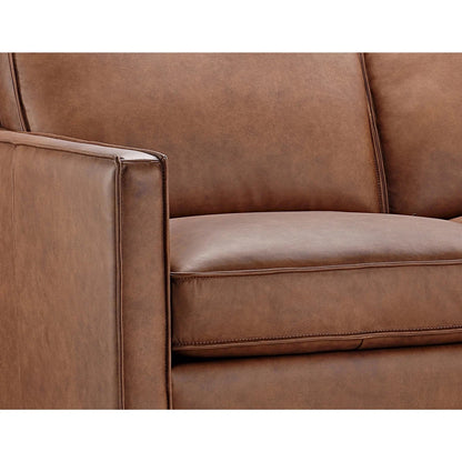 Brown leather sectional sofa with chaise and wooden legs