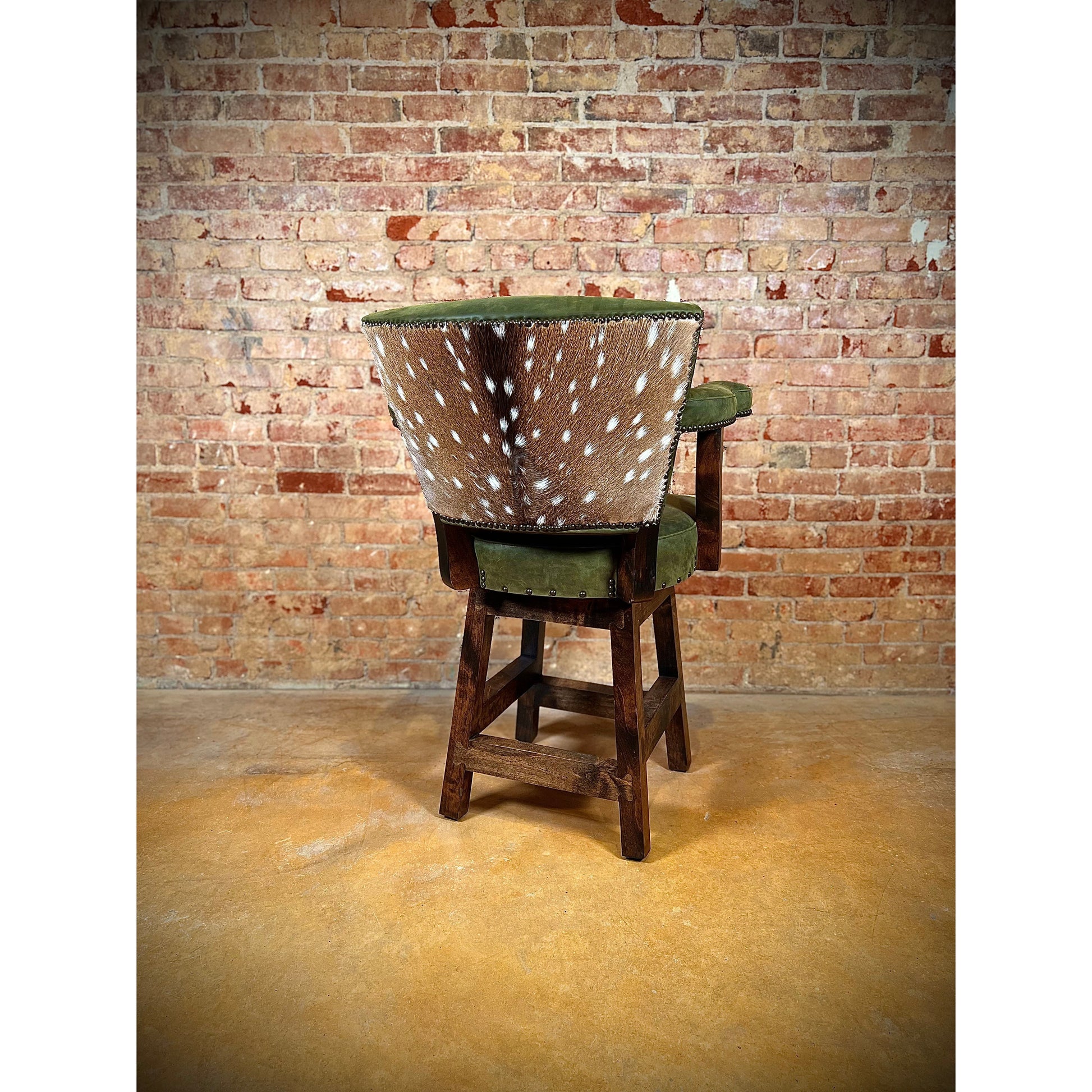 western bar stool with a spotted cowhide back