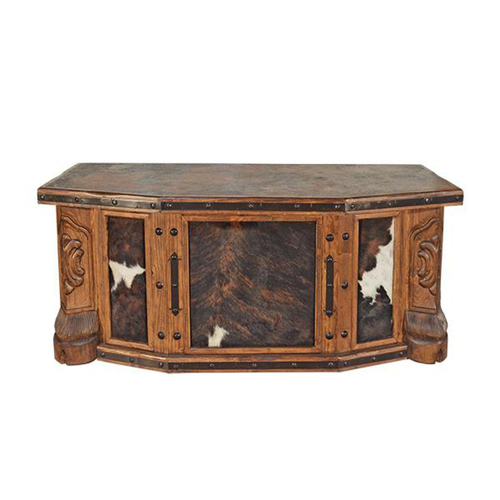 The Hand Carved Cowhide Desk brings elegance and sophistication to any room with its hand carved accent cowhide panels and stone top. Perfect for a modern home office, this timeless piece has been crafted with precise attention to detail and offers reliable stability without compromising on style.