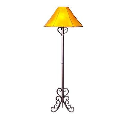 This Hand Forged Iron Floor Lamp is perfect for adding a touch of rustic charm to any room. Crafted from durable hand forged iron, it's well-suited for adding both a touch of style and a source of light to your home.