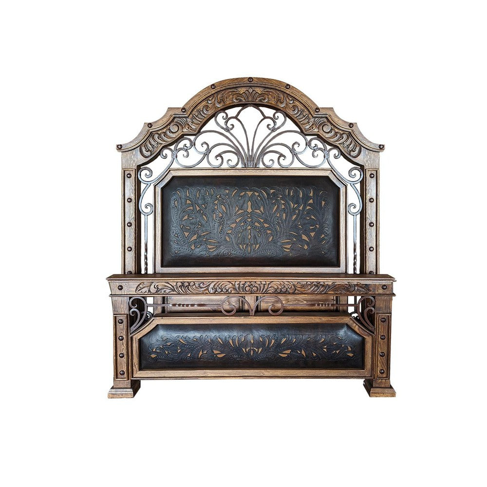 Experience next-level luxury with the Iron & Tooled Leather Bed. This bed features an iron scroll accent and tooled leather for a stunning combination of modern and classic elements. Enjoy the perfect night's sleep in an exquisite bed with superior craftsmanship and quality.