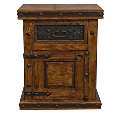 This Iron & Tooled Leather Nightstand brings an air of rustic elegance to any space. It is upholstered in tooled leather for an old-world feel. Perfect for providing storage and classic style.