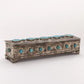This Turquoise Mantle Box will infuse your home decor with an authentic, timeless appeal. Handcrafted with skillful attention to detail, this decorative storage box is lined with luxurious velvet and features a genuine turquoise stone centerpiece. Perfect for safeguarding your cherished keepsakes or elevating your home decor.