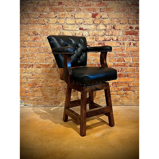 The Midnight Vaquero Chisum Counter Stool features a swivel capability and a tufted back, providing both functionality and style. The cowhide back adds a rustic touch to any space. With this counter stool, enjoy a comfortable and unique seating experience.