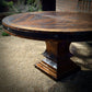 distressed round wood table