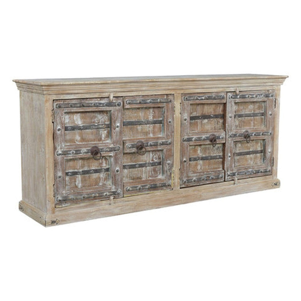 This Rainforest Sideboard is stylish and sustainable, crafted with recycled old doors and durable mango wood. The 90-inch sideboard provides ample storage for all of your essentials. Get the perfect blend of function and fashion with this high-quality piece.