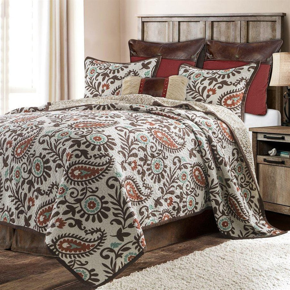 The Rebecca Paisley Quilt Set will add a lively touch to any bedroom with its timeless paisley pattern in warm shades of earthy color. It is finished with beautiful florals and can be complemented with vibrant accents using pillows, euro shams and other pieces from the coordinating Cheyenne Collection. Enhance the look with coordinating valances, kitchen/bath rugs and shower curtains to complete the look.