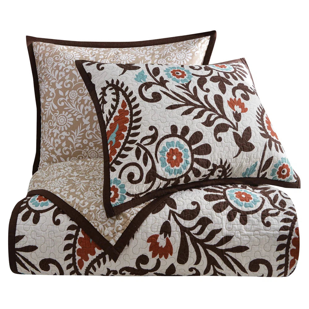 The Rebecca Paisley Quilt Set will add a lively touch to any bedroom with its timeless paisley pattern in warm shades of earthy color. It is finished with beautiful florals and can be complemented with vibrant accents using pillows, euro shams and other pieces from the coordinating Cheyenne Collection. Enhance the look with coordinating valances, kitchen/bath rugs and shower curtains to complete the look.