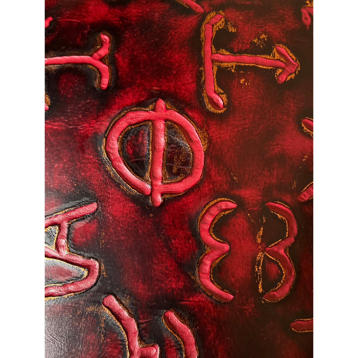 close-up image of branded detailing on leather