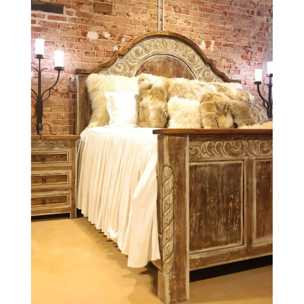 The Regency Bed adds sophisticated, traditional style to any bedroom. Crafted from hand carved, reclaimed wood with a curved top and a hand distressed cream wash, this classic piece is sure to elevate any room.