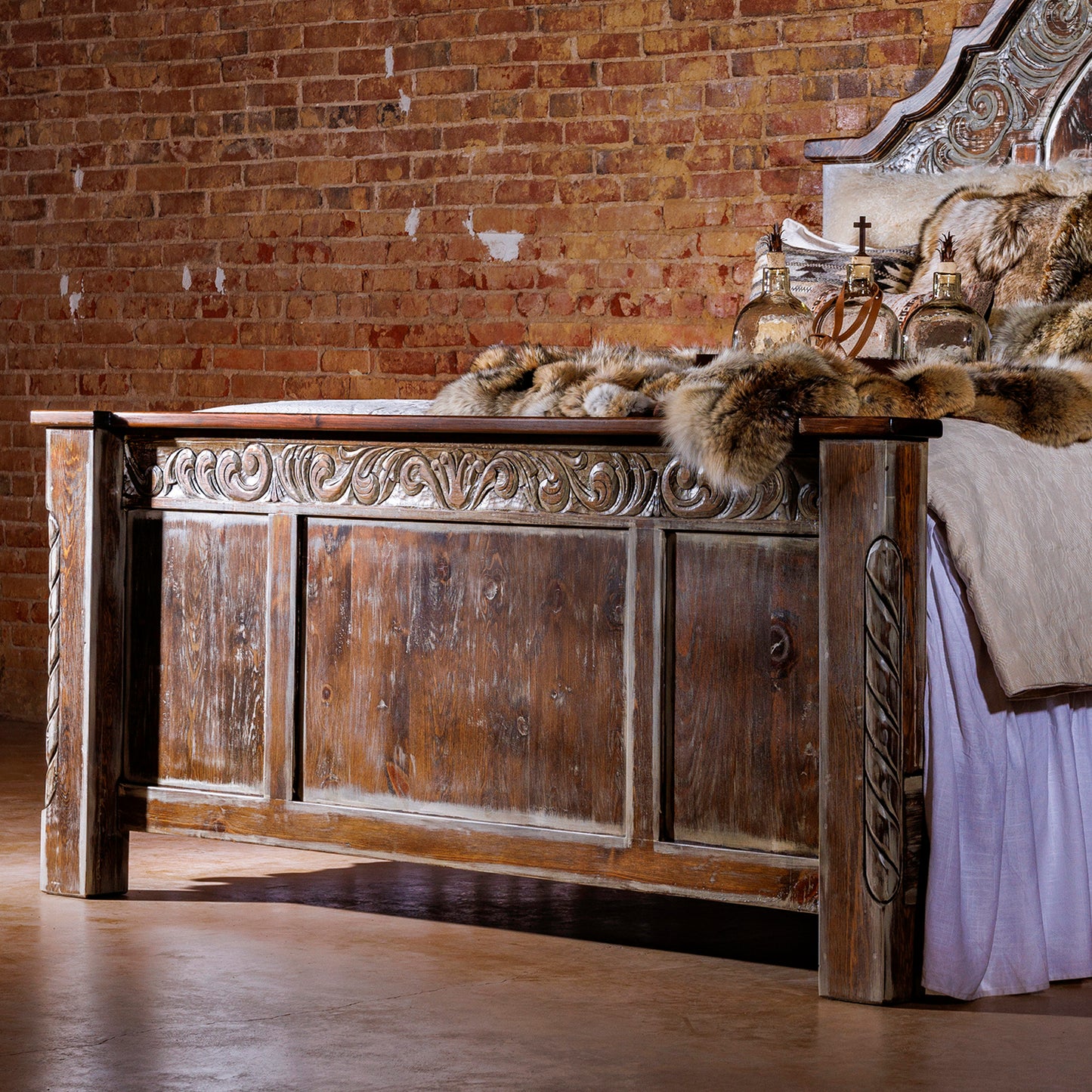 The Regency Wood Bed Frame adds a sophisticated, traditional, and rustic style to any bedroom. Crafted from hand-carved, reclaimed wood with a curved top and a hand-distressed cream wash, this classic piece of bedroom furniture is sure to elevate any room.
