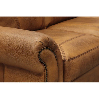 The San Angelo Sofa is skillfully crafted with quality and style. Featuring top grain leather, rolled arms, picture frame stitching on the seat back and seat, and elegant nailhead trim, this sofa is modern luxury at its best. Its hand antiqued Italian leather gives it a distinguished look.