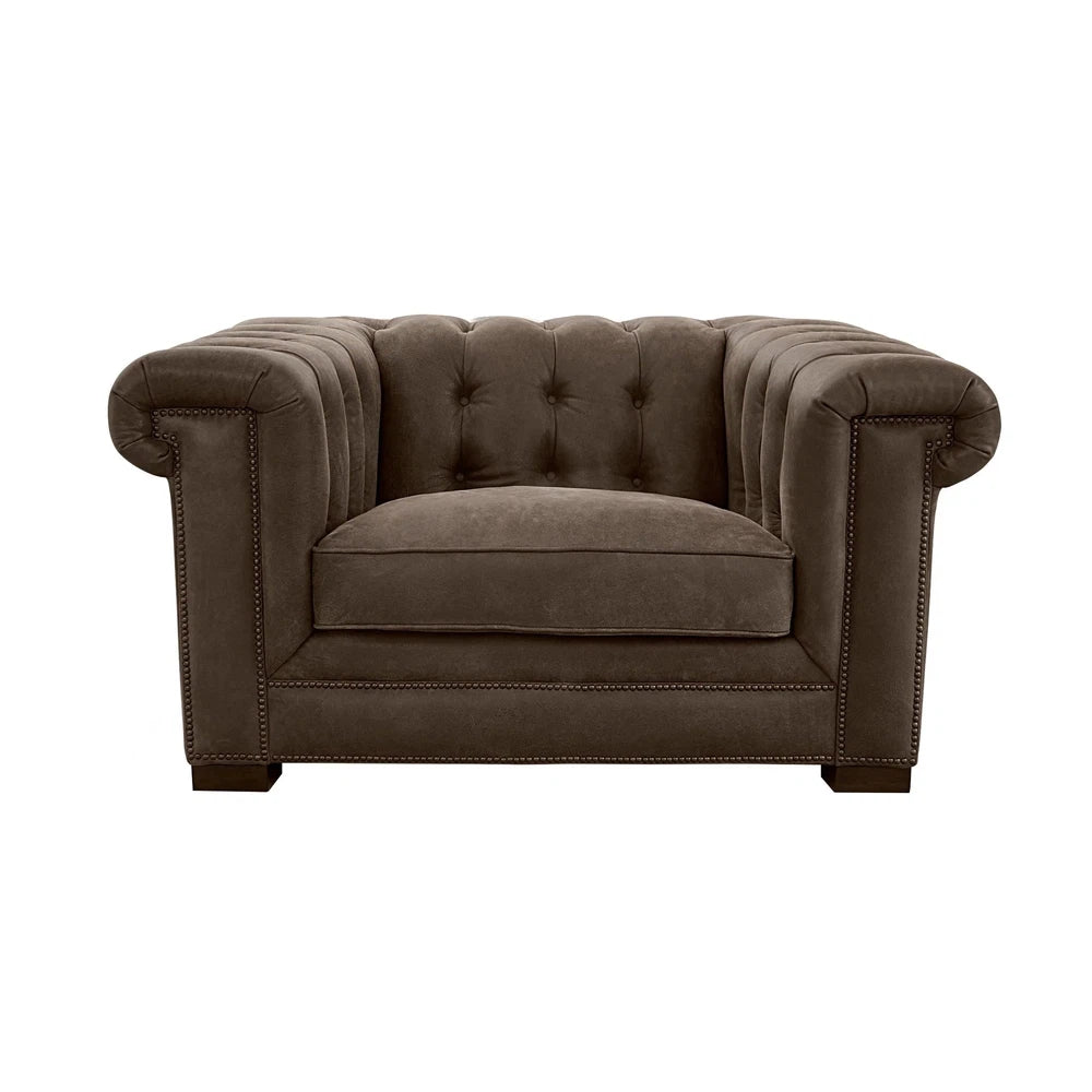The Selleck Chair features a hardwood frame and a key panel arm to provide strength and support. Upholstered with top grain leather all over, it has a button tufted design and comes in either a western or modern style. Providing both superior style and comfort, this chair is the ideal choice for any living space.