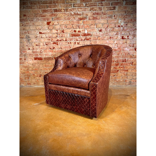 Indulge in luxury and western charm with our 360 degree swivel chair. The tufted inside back and top grain leather all over provide comfort and style, while the diamond stitch trim adds a touch of elegance. Add a classic, yet modern, touch to your space.