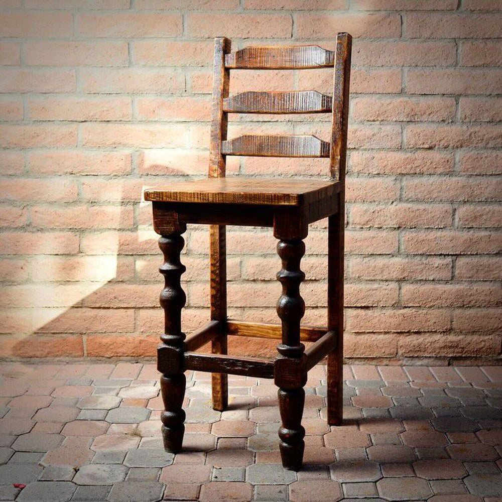 Elevate your space with the Old Fashion Stool. This stylish chair is crafted of reclaimed wood, with a ladder back style for maximum comfort. Perfect for any dining room. 