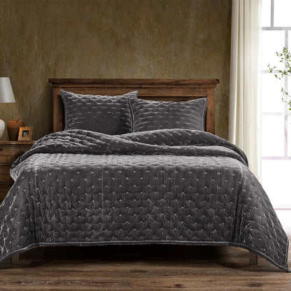 Our Stella Velvet Quilt brings a luxurious sheen to your bedding with its rich faux silk velvet fabric. The quilted design provides subtle texture, while its selection of neutral and vibrant jewel tone colors will fit seamlessly into your home's traditional, Western, or rustic décor. Enjoy its soft, sumptuous feel and complete the look by pairing it with other pieces from the Stella Collection.