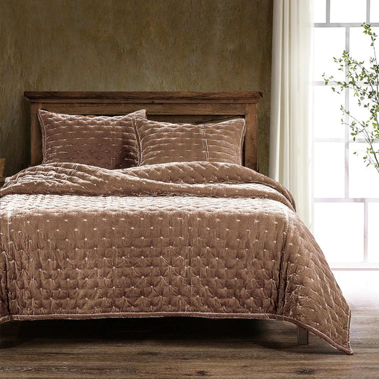 Our Stella Velvet Quilt brings a luxurious sheen to your bedding with its rich faux silk velvet fabric. The quilted design provides subtle texture, while its selection of neutral and vibrant jewel tone colors will fit seamlessly into your home's traditional, Western, or rustic décor. Enjoy its soft, sumptuous feel and complete the look by pairing it with other pieces from the Stella Collection.