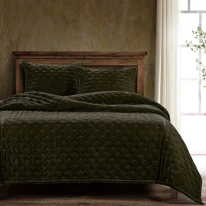 Our Stella Velvet Quilt brings a luxurious sheen to your bedding with its rich faux silk velvet fabric. The quilted design provides subtle texture, while its selection of neutral and vibrant jewel tone colors will fit seamlessly into your home's traditional, Western, or rustic décor. Enjoy its soft, sumptuous feel and complete the look by pairing it with other pieces from the Stella Collection.