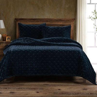 Our Stella Velvet Quilt brings a luxurious sheen to your bedding with its rich faux silk velvet fabric. The quilted design provides subtle texture, while its selection of neutral and vibrant jewel tone colors will fit seamlessly into your home's traditional, Western, or rustic décor. Enjoy its soft, sumptuous feel and complete the look by pairing it with other pieces from the Stella Collection.