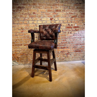 Crafted with genuine top grain leather, the Sunset Chisum Barstool offers a comfortable seating option with a touch of western charm. Perfect for any living or dining space, this barstool provides both style and comfort.