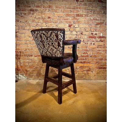 Crafted with genuine top grain leather, the Sunset Chisum Barstool offers a comfortable seating option with a touch of western charm. Perfect for any living or dining space, this barstool provides both style and comfort.