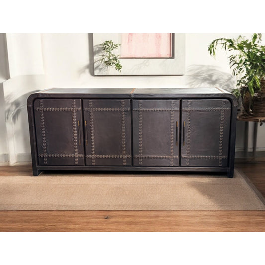 This elegant buffet features upholstered leather all over, giving it a luxurious look and feel. The sleek design and rich chocolate color make it the perfect addition to any dining or living space. Expertly crafted with high-quality materials, this buffet is sure to impress and elevate any room's style.