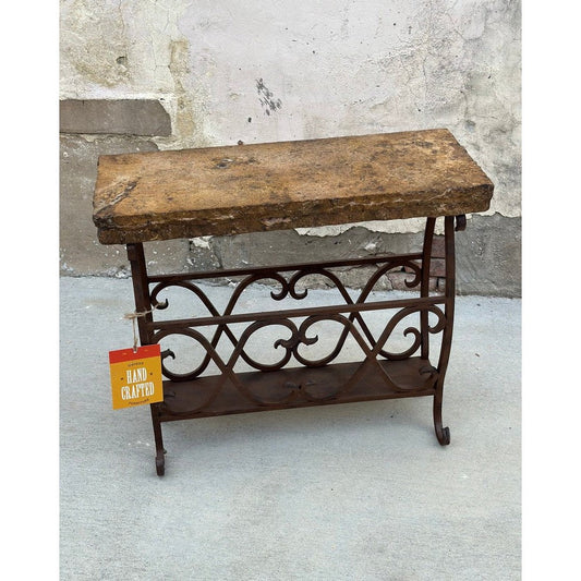 Upgrade your living room with this magazine table. It features a chiseled travertine top and iron base for a unique and stylish look. This side table combines practicality and modern design, offering an ideal solution for your living space.