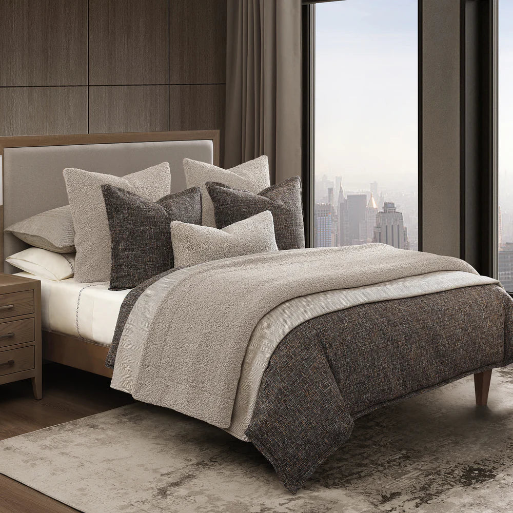 Dress your space to the nines with the sophistication of classic menswear suits with our Tweed Comforter Set. Pulling colors and textures from time-tested fashion, this textured tweed bedding is woven from multi-colored boucle yarns—specially spun for this collection. The tweed boucle fabric’s dense construction imparts a comforting weight, providing extra warmth and a coziness that makes you want to curl up under the thick comforter.