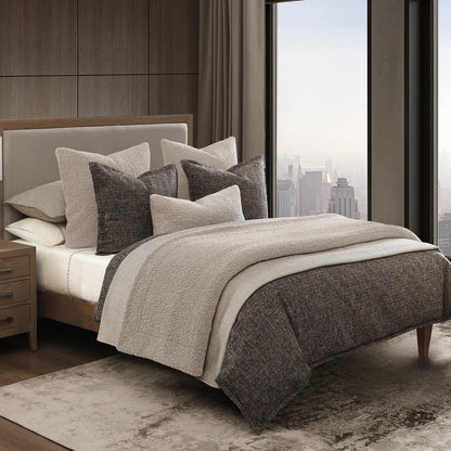 Dress your space to the nines with the sophistication of classic menswear suits with our Tweed Comforter Set. Pulling colors and textures from time-tested fashion, this textured tweed bedding is woven from multi-colored boucle yarns—specially spun for this collection. The tweed boucle fabric’s dense construction imparts a comforting weight, providing extra warmth and a coziness that makes you want to curl up under the thick comforter.