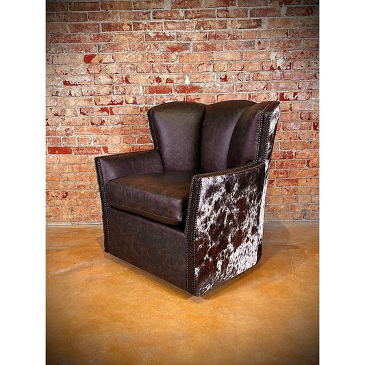 Indulge in luxurious comfort with our Western Coffee Leather Swivel Conch Chair! Made from top grain leather, this elegant chair boasts a 360 degree swivel and higher back for maximum relaxation. Wrapped in cowhide and featuring nailhead trim, it adds a touch of rustic charm to any space.