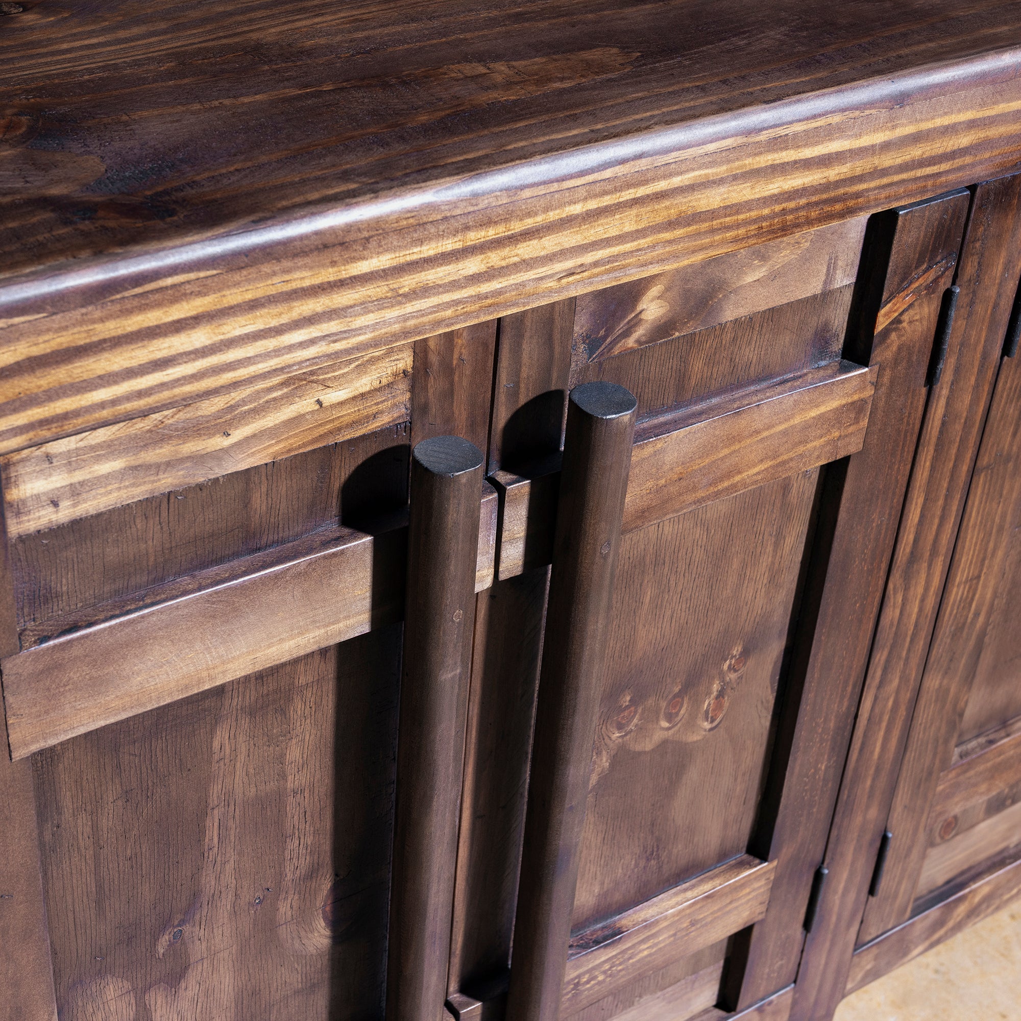 Close-up of Amarillo Ridge Buffet top and front panels showing rich wood grain texture