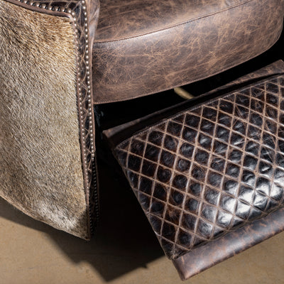Diamond embossed leather footrest close-up on Bitterroot Hide Cuddler Recliner, luxury Western reclining chair detail
