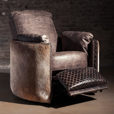 Bitterroot Hide Cuddler Recliner shown reclined with extended footrest, distressed leather and hair-on-hide Western recliner