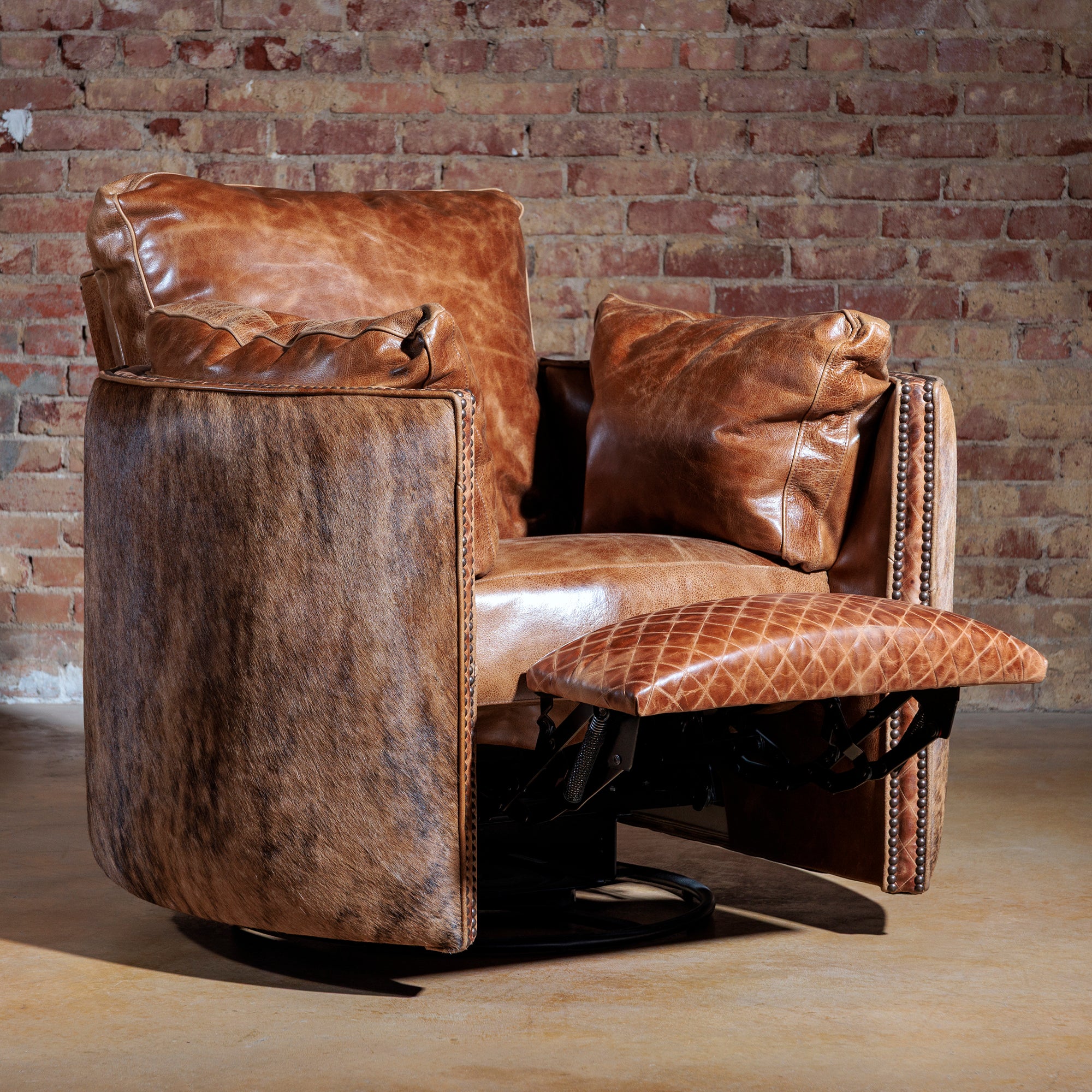 Dust Storm cowhide recliner fully reclined with top-grain leather and 360° swivel