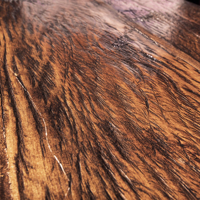 Close-up of reclaimed wood grain texture on Brazos carved Western sideboard