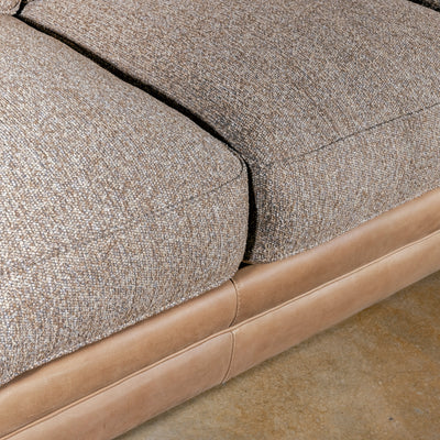 Bridger Nailhead Sofa western sofa seat detail with woven cushions, saddle leather base, and tailored Western texture